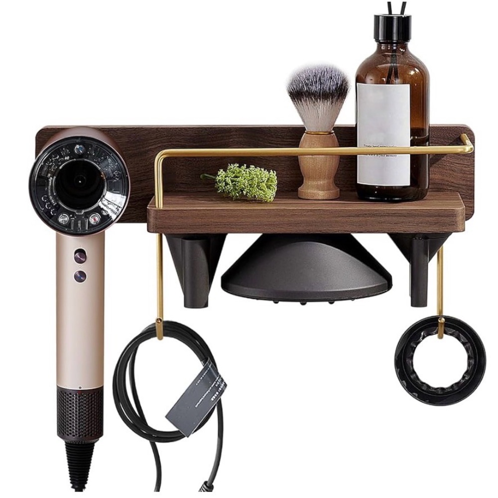 Dyson supersonic hairdryer wall mounted holder with brass accents.